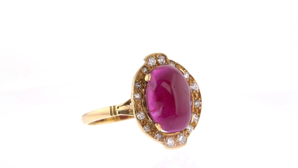 Cocktail Ring: Cabochon Ruby Halo Ring in 18k Yellow Gold