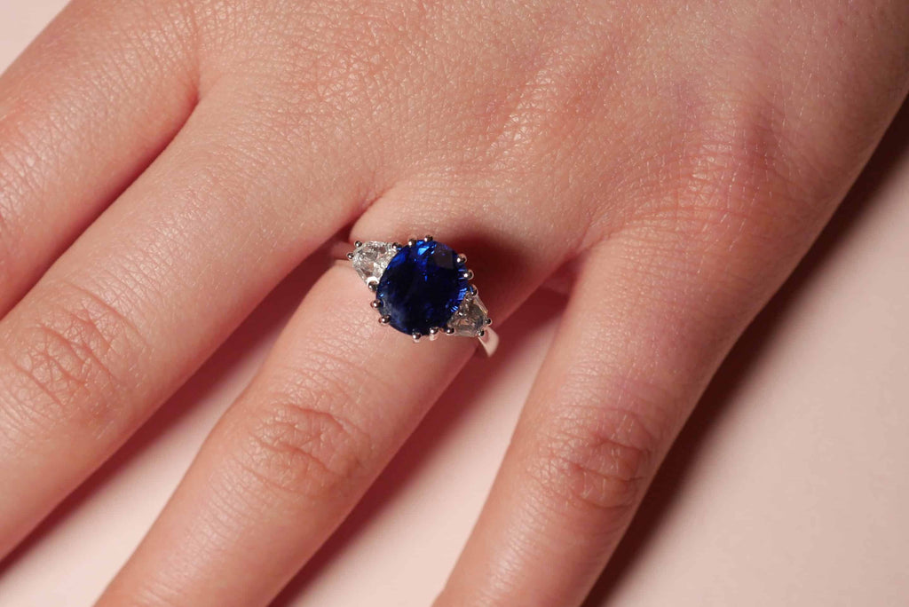 Engagement Ring: Oval Sapphire Three Stone Ring in 18k White Gold