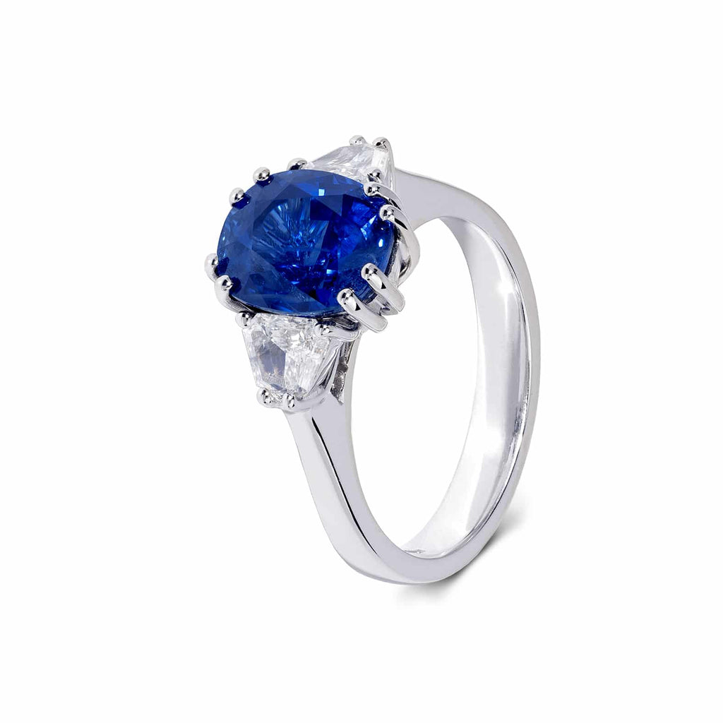 Engagement Ring: Oval Sapphire Three Stone Ring in 18k White Gold