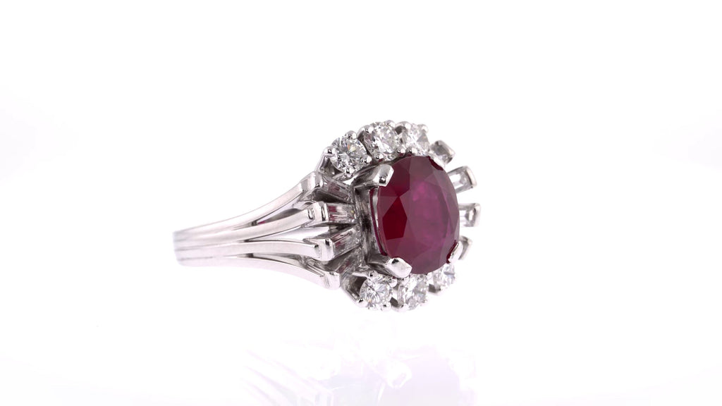 Engagement Ring: Oval Ruby Halo Ring in 18k White Gold