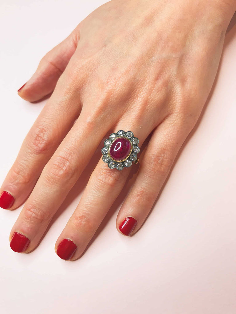 Cocktail Ring: Vintage Style Cabochon Ruby Halo Ring