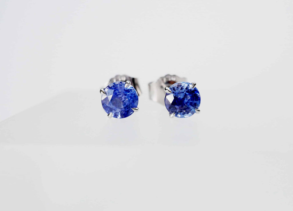 Stud Earrings: Round Sapphire Solitaire Earrings in 18k White Gold