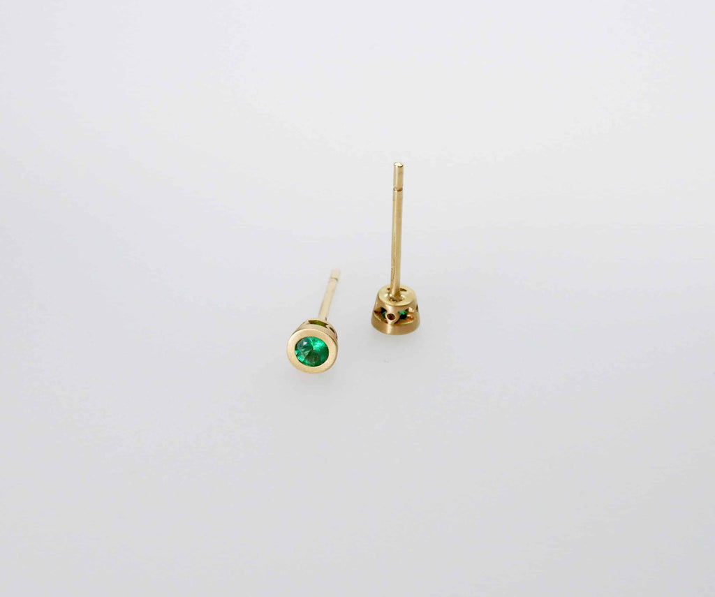 Stud Earrings: Round Emerald Solitaire Earrings in 18k Yellow Gold